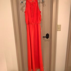 Orange maxi dress of crinkle polyester.
